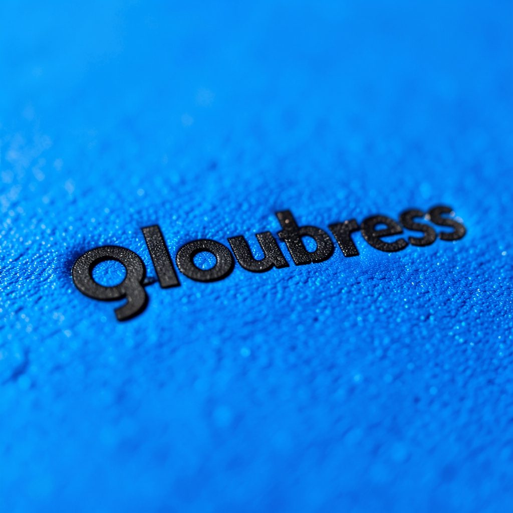 A minimal abstract composition of a dark logotype on a clean white background, with soft shadows and a single bright accent shape in sky blue.